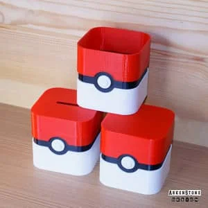 Boites de rangement imprimés en 3D en cube reprenant le desing d'un pokéball