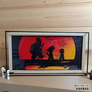 Grand cadre en bois et métal avec les personnages de Dragonball en silhouette